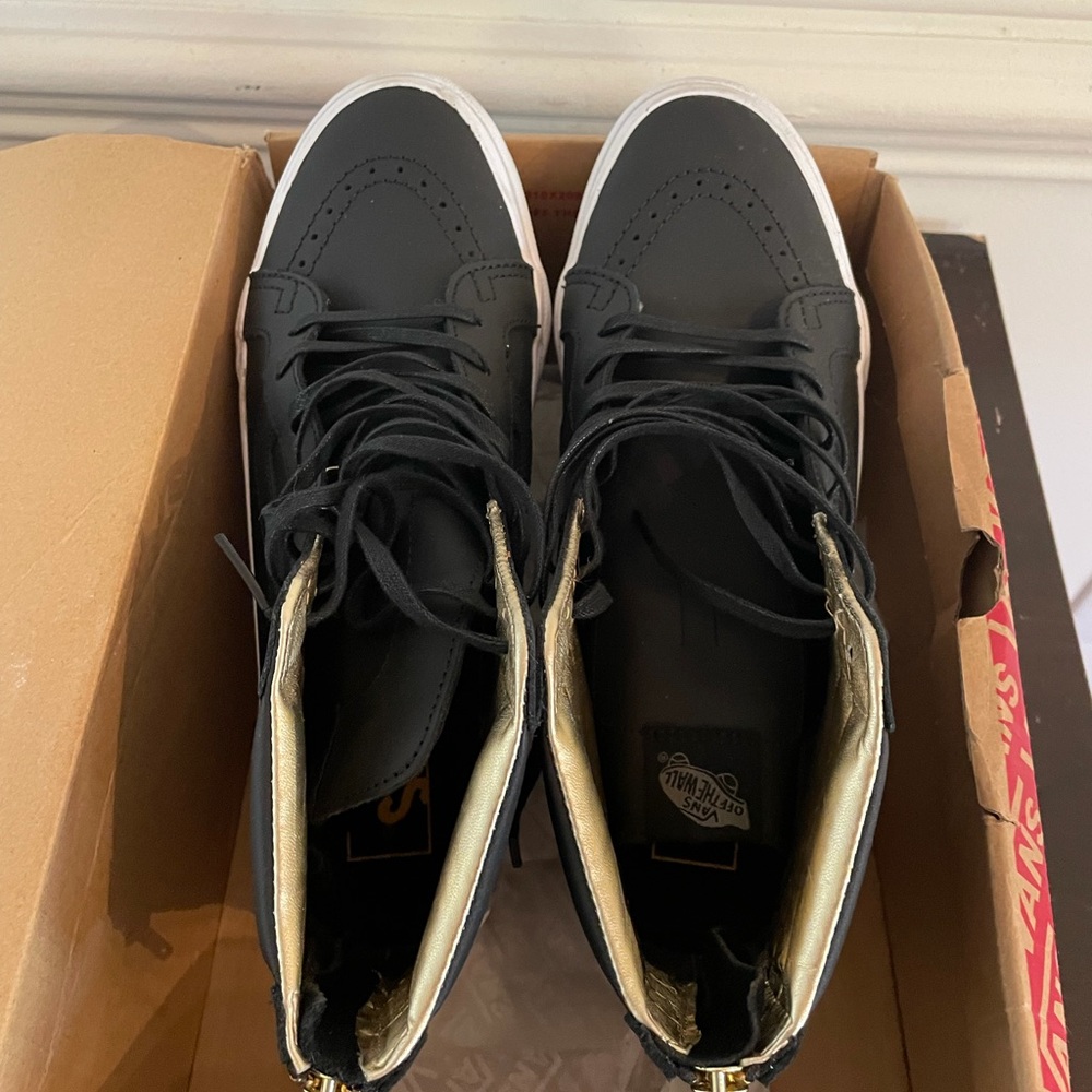 Vans Black and Gold High-Top Sneakers